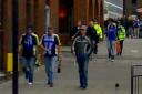Cardiff fans walking through Harrow town centre after the game.