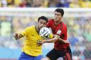 Hector Moreno (right) grapples with Brazil striker Fred (left). Picture: Action Images