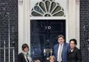 Deputy Mayor for Policing Kit Malthouse hands the petition in at Downing Street with Claire Lambert and her children and Ms Reeves