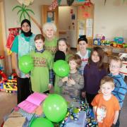 Children from the Finchley Progressive Synagogue deliver gifts and get well cards to children in Barnet Hospital