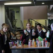 Students from Jewish Community Secondary School make toiletry hampers during lunchtime last Friday for Mitzvah Day