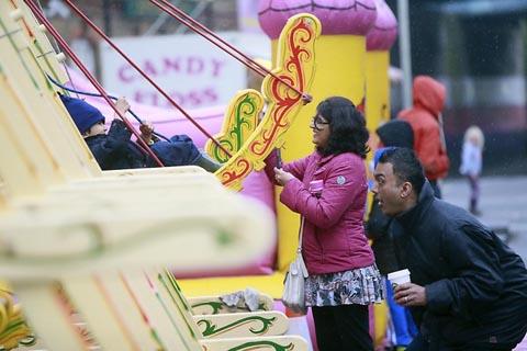 The sound of fairground music mingled with the delighted screams of people on rides at Pinner Fair yesterday - and our photographer Peter Beale was there to capture it the day pictures.