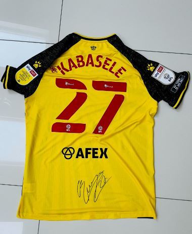 The signed Christian Kabasele shirt given to Fabio