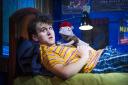 Harry Melling on stage as Jason with puppet Tyrone