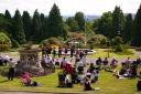 Guests with picnic hampers enjoyed the sun on the lawn outside Bentley Priory on Saturday. Picture by Mike Tagg.