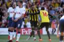 Watford's Etienne Capoue and Abdoulaye Doucoure celebrate after downing Spurs on Sunday. Picture: Action Images