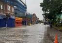 LIVE - Road closures in place as burst water main floods shops
