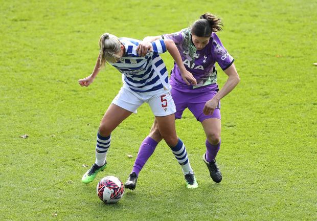 Harrow Times: Reading's Gemma Evans (left) and Tottenham Hotspur's Rachel Williams battle for the ball during the Barclays FA Women's Super League match at the Select Car Leasing Stadium, Reading. Photo via PA/Bradley Collyer.