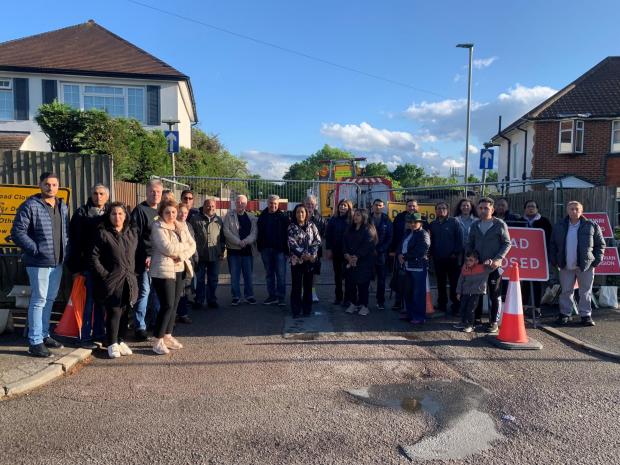Harrow Times: Frustrated residents standing in front of Pike Road, which they want opened as a priority 