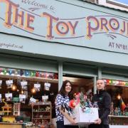 Dan, the collection driver from Attic and Emma, shop assistant at The Toy Project.
