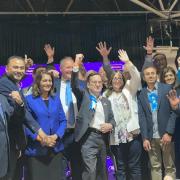 Cllr Paul Osborn (centre) as Conservatives celebrate victory in the 2022 Harrow local elections