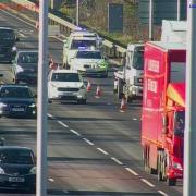 An overturned vehicle on the M4 has led to traffic delays