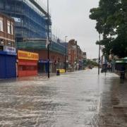 LIVE - Road closures in place as burst water main floods shops