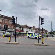 Police have cordoned off Pinner Road following the stabbing