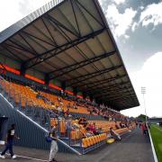 Barnet FC may have to demolish their new west stand after being given an enforcement notice by Harrow Borough Council