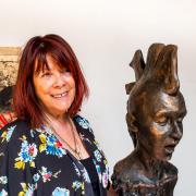 Cheryl with one of her punk sculptures