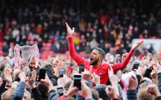 Jobi McAnuff is lifted by Leyton Orient fans Picture: PA