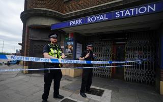 Police outside Park Royal underground station, west London the scene of a fatal crash in which a Range Rover ended up on the track. Picture: PA