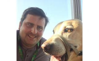Stephen Anderson and his guide dog Barney