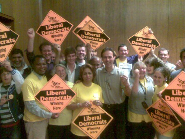 Afifa Pervez (pictured centre) celebrates her by-election win with Lib Dem activists at Brent Town Hall.